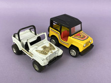 Two Vintage Diecast Jeeps CJ 7